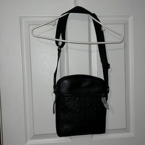 Black Coach cross body satchel.